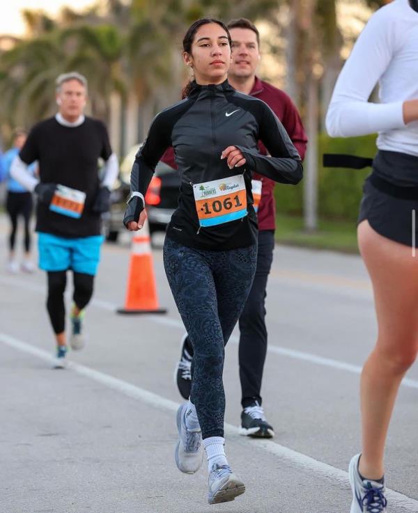 Arielle Valdes running in a race