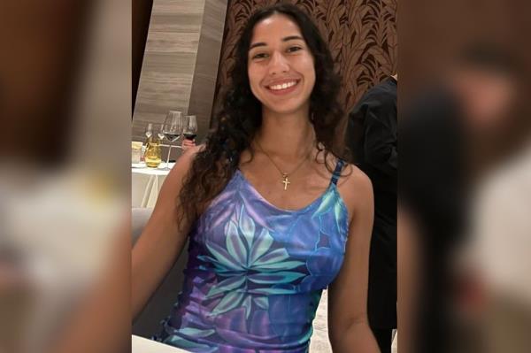 Arielle Valdes, 21, in a blue and purple floral top