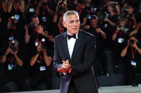 George Cloo<em></em>ney in a suit and bow tie at the Venice Internatio<em></em>nal Film Festival World Premiere of Apple Original Film 'Wolfs.'