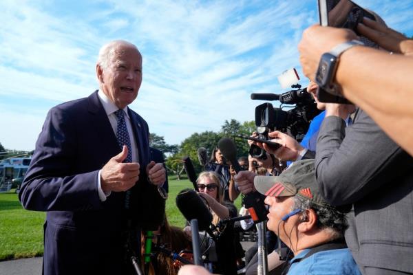 Biden talks to reporters on the South Lawn of the White House, Monday, Sept. 2, 2024.